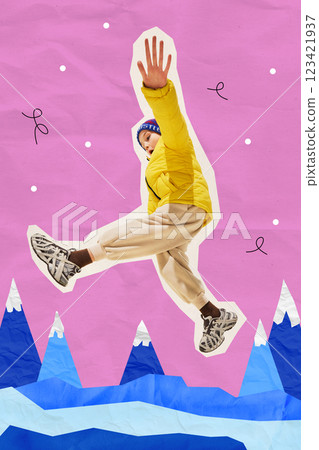 Excited boy in yellow jacket leaping over snowy mountains, playing with carefree energy, feeling limitless. Contemporary art collage. 123421937