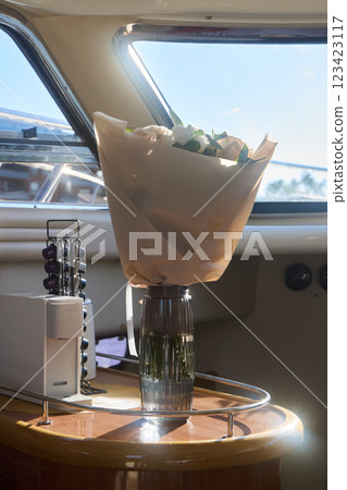 The Elegant Floral Arrangement on a Yacht creates a stunning visual impact that enhances the space The Elegant Floral Arrangement on a Yacht creates a stunning visual impact that enhances the space 123423117