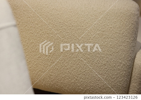 Closeup view of beautifully textured upholstery showcasing a neutral tone for style and comfort 123423126