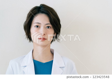 A woman in a white coat A woman in a white coat 123423548