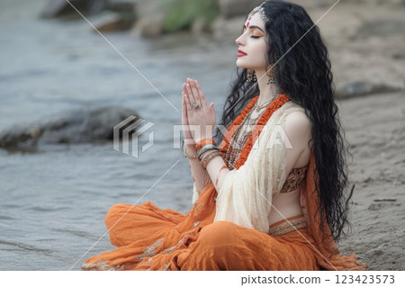 Sacred presence: portrayal of Ganga Goddess, representing embodiment of divine grace and the sacred river's eternal flow, reflecting role as source of spiritual renewal, revered figure in Hinduism. Sacred presence: portrayal of Ganga Goddess, representing embodiment of divine grace and the sacred river's eternal flow, reflecting role as source of spiritual renewal, revered figure in Hinduism. 123423573