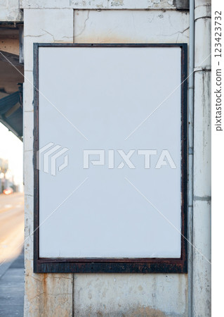 Blank vertical billboard on wall Blank vertical billboard on wall 123423732
