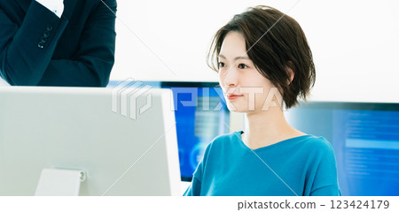 Businesswoman receiving advice from her boss Businesswoman receiving advice from her boss 123424179