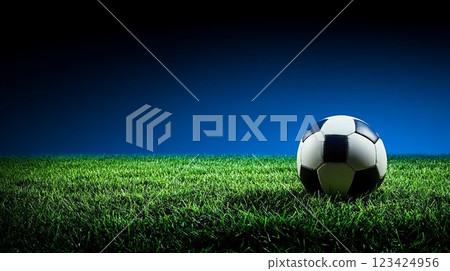 Blue and Green Gradient Background with Football on Grass Field for Sports Theme 123424956