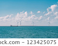 Wind turbines on the sea 123425075