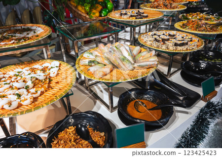 traditional Asian buffet food in restaurant in Asia. Vietnamese spring rolls and rolls in hotel for breakfast traditional Asian buffet food in restaurant in Asia. Vietnamese spring rolls and rolls in hotel for breakfast 123425423