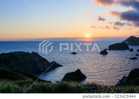 The ocean at sunset as seen from Yusuge Park. Daikon Island, Hirizo Beach, and Aiai Cape are visible. Minamiizu Town, Kamo District, Izu Peninsula, Shizuoka Prefecture 123425944