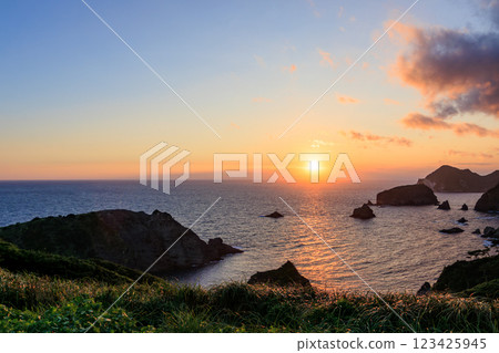 The ocean at sunset as seen from Yusuge Park. Daikon Island, Hirizo Beach, and Aiai Cape are visible. Minamiizu Town, Kamo District, Izu Peninsula, Shizuoka Prefecture 123425945