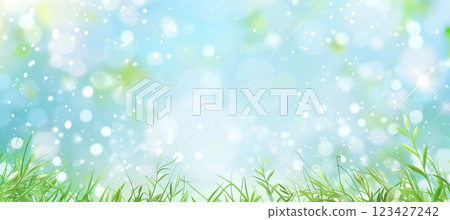 Vibrant spring background of green grass with bokeh for healthy living themes 123427242