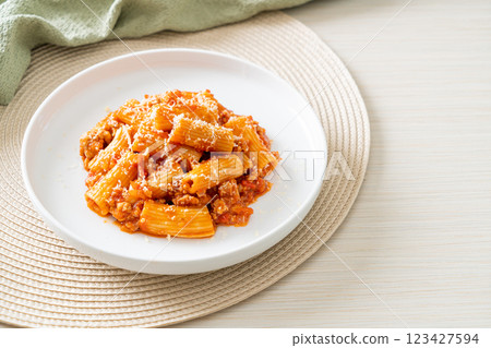 Rigatoni pasta bolognese with cheese Rigatoni pasta bolognese with cheese 123427594