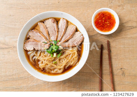 duck noodles with stewed duck soup 123427629