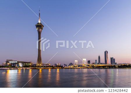 Beautiful night view of the Macau Tower and the Sai Van Bridge crossing Praia Grande Bay (Nam Van) and connecting Taipa Island and Macau Peninsula. Beautiful night view of the Macau Tower and the Sai Van Bridge crossing Praia Grande Bay (Nam Van) and connecting Taipa Island and Macau Peninsula. 123428442