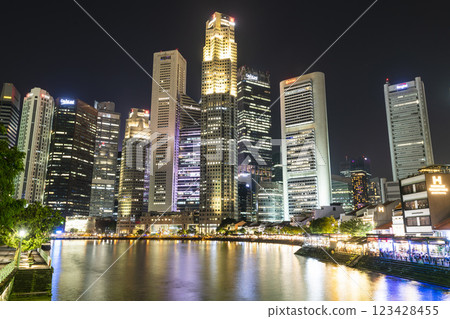 Night view of the skyscrapers in the Financial District of Boat Quay along the Singapore River. Night view of the skyscrapers in the Financial District of Boat Quay along the Singapore River. 123428455