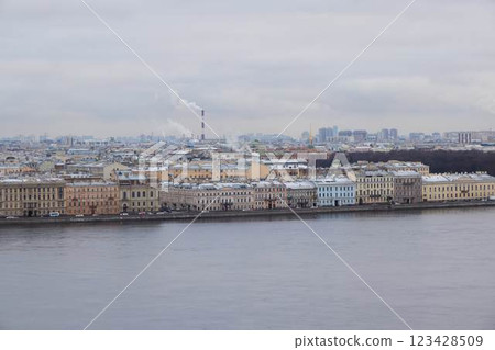 A picturesque winter scene featuring the historic riverfront of St. Petersburg, showcasing A picturesque winter scene featuring the historic riverfront of St. Petersburg, showcasing 123428509