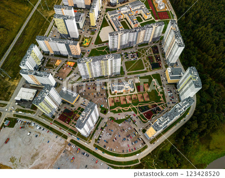 Aerial View of a Modern Residential Complex Highlighting Green Spaces and Design Features 123428520