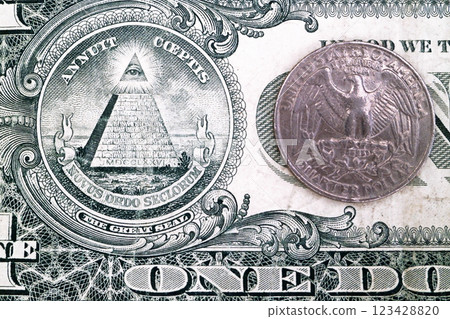 25 cents coin and a 1 dollar bill 25 cents coin and a 1 dollar bill 123428820