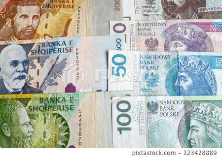 Close-up on a stack of Albanian Lek and Polish Zloty Close-up on a stack of Albanian Lek and Polish Zloty 123428889