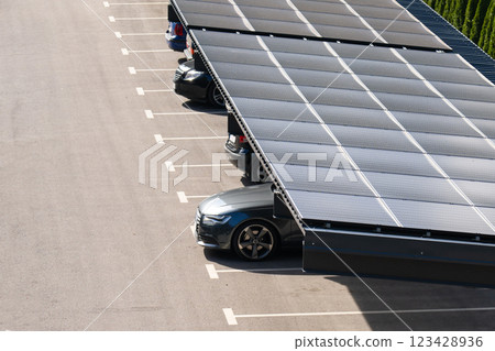 Parking space with solar panels on a roof. Solar canopy Parking space with solar panels on a roof. Solar canopy 123428936