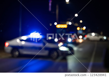 Road police blocked traffic at night. Blurred 123428941