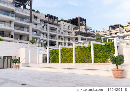 Vertical garden on a green wall. Environmentally friendly urban space. 123429148