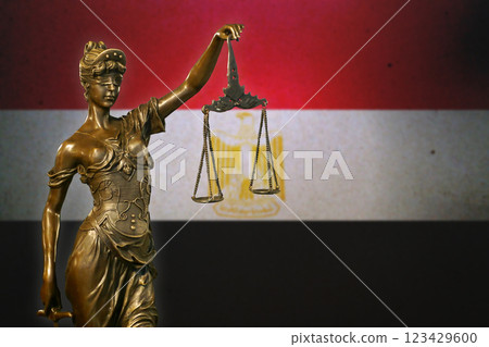 Lady Justice before a flag of Egypt Lady Justice before a flag of Egypt 123429600