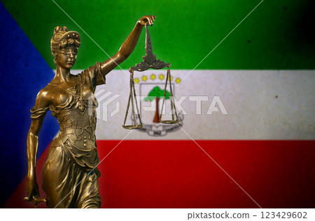 Lady Justice before a flag of Equatorial Guinea 123429602