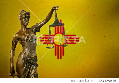 Lady Justice before a flag of New Mexico Lady Justice before a flag of New Mexico 123429616