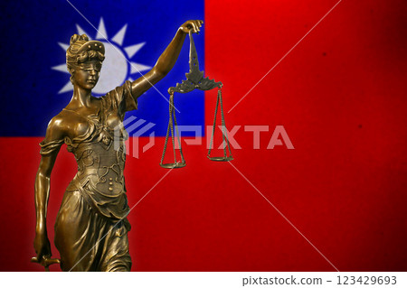 Lady Justice before a flag of Taiwan 123429693