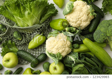 Set of protein vegetables and bag on white wooden background, top view Set of protein vegetables and bag on white wooden background, top view 123429965