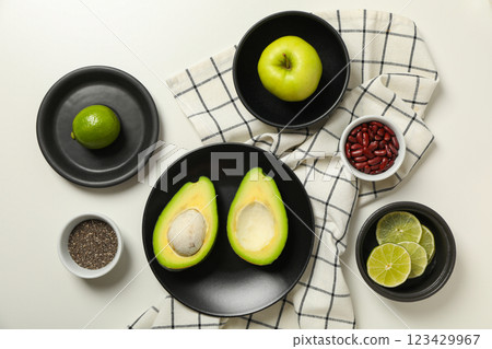 Set of vegan protein products on plate and towel on white background, top view 123429967
