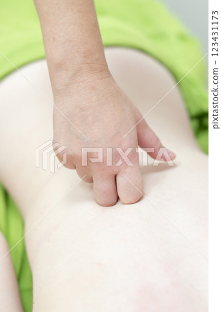 Caucasian woman on manual back massage. Caucasian woman on manual back massage. 123431173