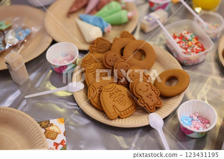 Delightful Festive Gingerbread Cookies topped with Colorful Decorations and Icing Galore 123431195