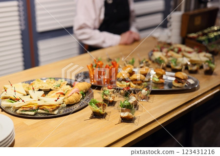 An Elegant Buffet Featuring a Wide Array of Appetizers and Refreshments for Every Occasion An Elegant Buffet Featuring a Wide Array of Appetizers and Refreshments for Every Occasion 123431216