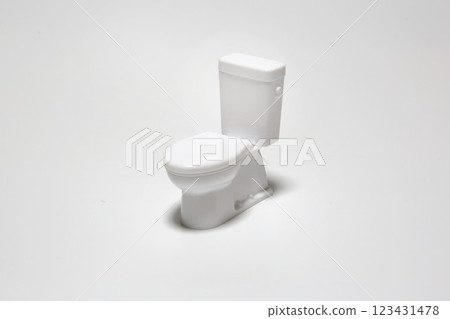 Toilet image Miniature white toilet bowl Toilet image Miniature white toilet bowl 123431478