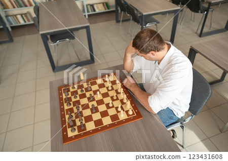 Portrait Caucasian man playing chess. Portrait Caucasian man playing chess. 123431608