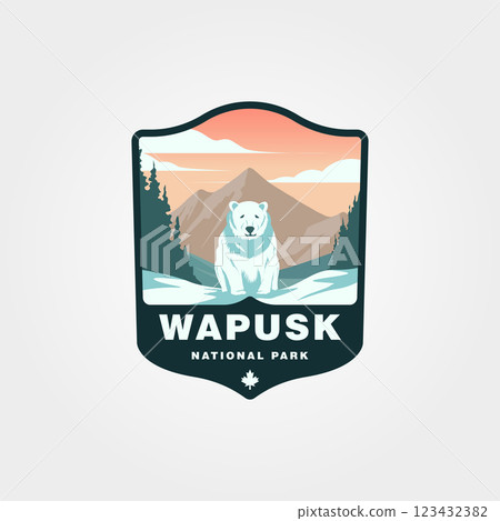 A polar bear stands in snowy Wapusk National Park mountains vintage logo design 123432382