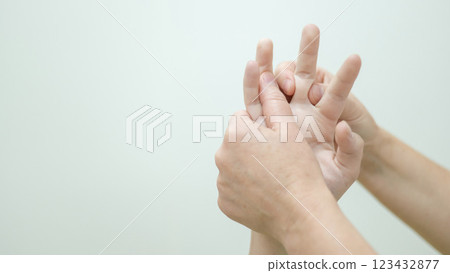 Close-up of female hands during massage.  Close-up of female hands during massage.  123432877