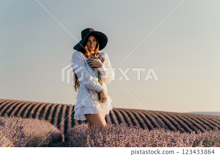 Woman in White Dress in Lavender Field Woman in White Dress in Lavender Field 123433864