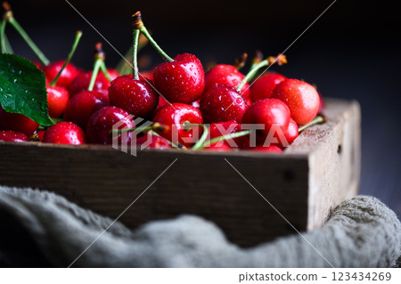 Freshly washed ripe juicy red cherries with water droplets Freshly washed ripe juicy red cherries with water droplets 123434269