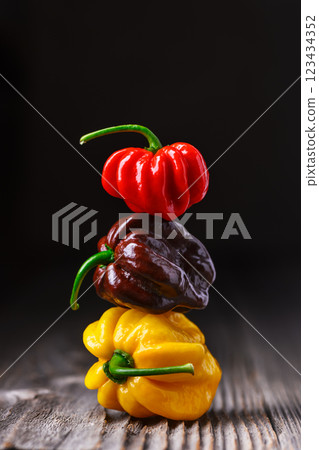 Tower from multicolored habanero peppers 123434352
