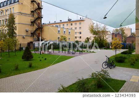 Urban Park Featuring a Play Area for Children and Sufficient Bicycle Parking Facilities 123434393
