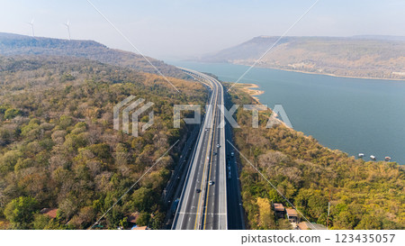 Drone shot aerial view landscape of the M6  motorway Expressway Nakhon Ratchasima Province - Bang Pa-in. Lam Ta Khong River and Mountain. Drone shot of scenic landscape rural place traffic. Nakhon 123435057