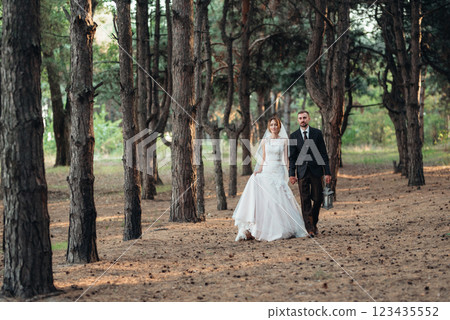 walk of the bride and groom through the autumn forest walk of the bride and groom through the autumn forest 123435552