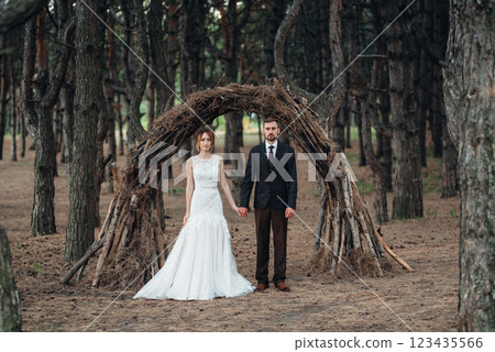walk of the bride and groom through the autumn forest walk of the bride and groom through the autumn forest 123435566