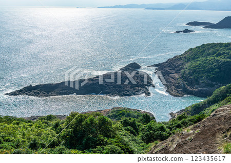 Hyuga City, Miyazaki Prefecture: "The Sea of the Cross Where Wishes Come True" where rocks eroded by the waves look like a cross Hyuga City, Miyazaki Prefecture: "The Sea of the Cross Where Wishes Come True" where rocks eroded by the waves look like a cross 123435617