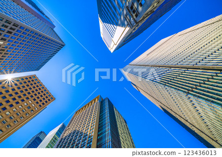 Tokyo cityscape in Japan. Warm sunshine like spring... Looking at the business district from the "Otemachi Station" intersection... A ray of hope 123436013