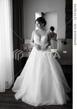 bride in a white dress at the training camp 123436282