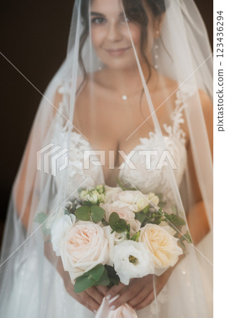 bride in a white dress at the training camp bride in a white dress at the training camp 123436294