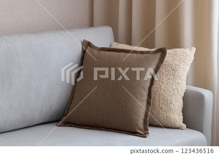 Stylish and Colorful Decorative Pillows on a Cozy and Modern Couch for Your Living Room Stylish and Colorful Decorative Pillows on a Cozy and Modern Couch for Your Living Room 123436516