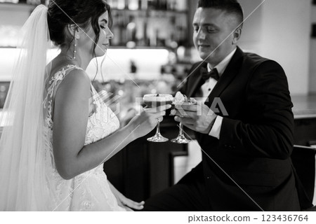 bride and groom inside a cocktail bar 123436764